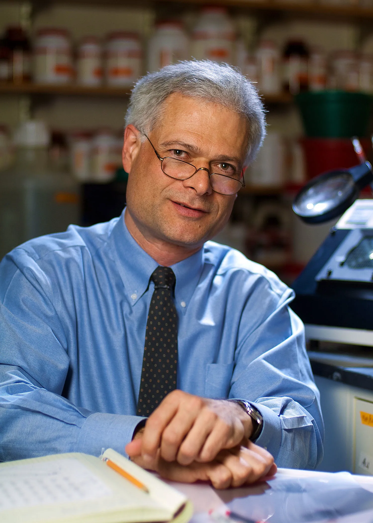 Alan D. D'Andrea, M.D. D'Andrea in his lab where he works on identifying active DNA repair pathways in cancer cells and designing drugs to block them.
CAPTION: Researcher Alan D'Andrea probes cancer cells' "repair kits" that allow them to survive treatments that damage their DNA. The goal is to match tumors with drugs that knock out their DNA repair mechanisms.